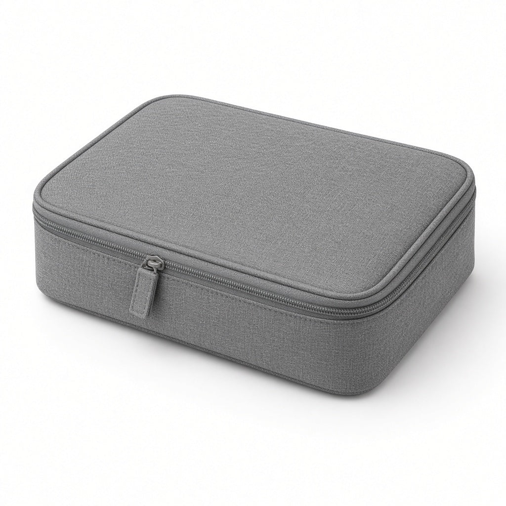 Gray zippered travel toiletry pouch on a white background