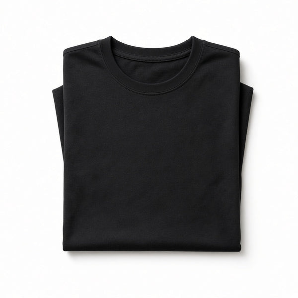 Folded black cotton crew-neck t-shirt on a white background
